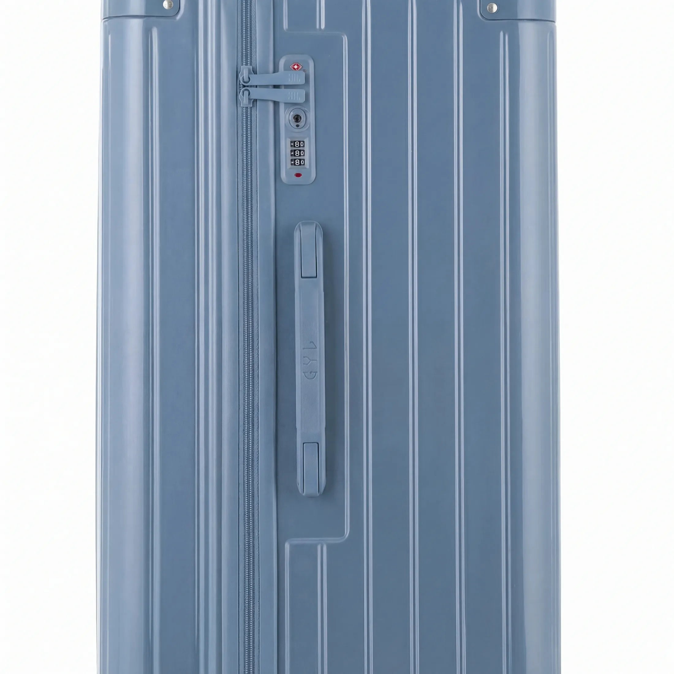 Détail de la serrure TSA et de la poignée latérale sur la valise trunk bleu gris. #couleur_bleu grisé