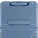 Vista superior de la maleta baúl GYL gris azul en policarbonato, con asa central y esquinas reforzadas. #color_gris_azul