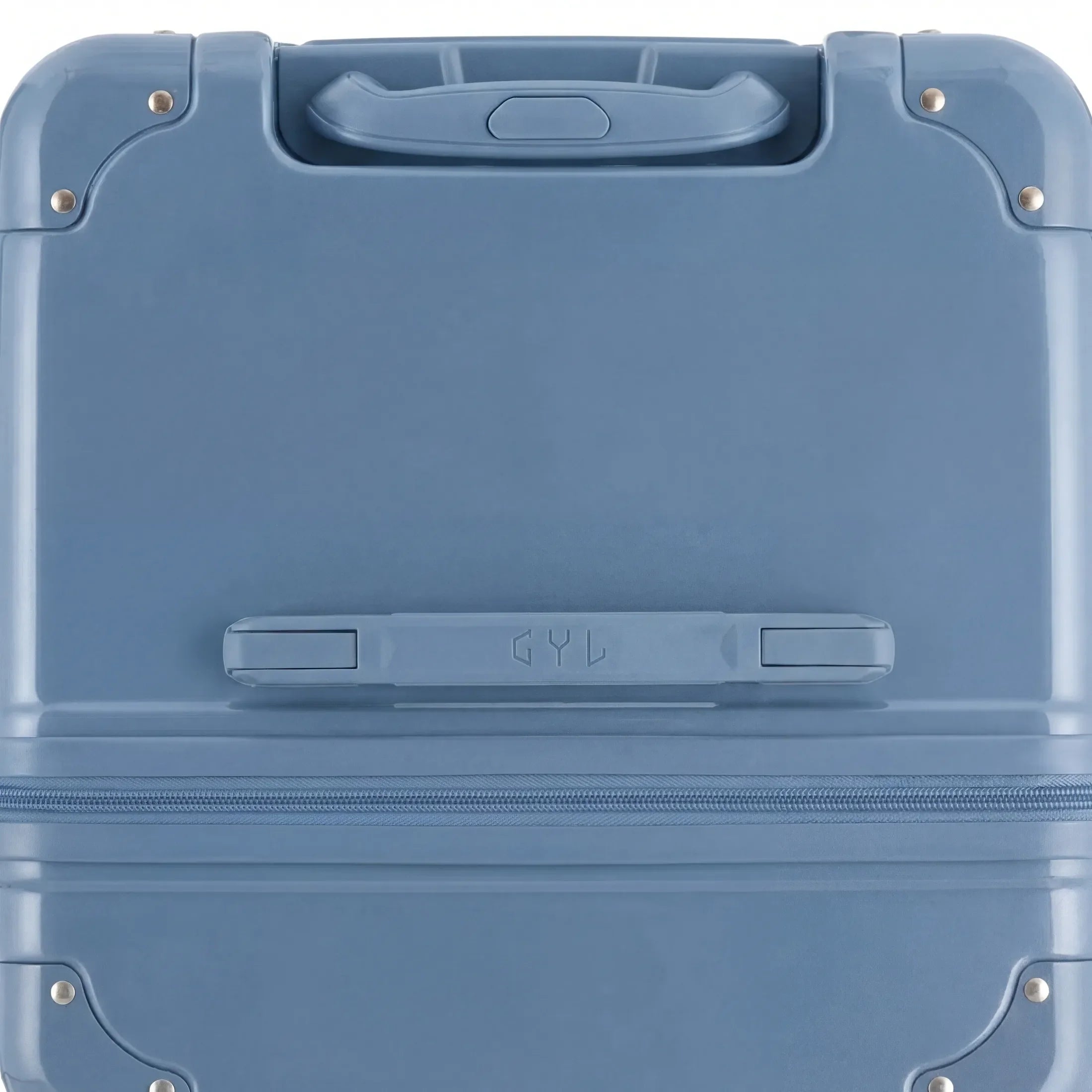 Vue du dessus de la valise trunk GYL bleu gris en polycarbonate, avec poignée centrale et coins renforcés. #couleur_bleu grisé