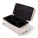 Intérieur de la valise trunk GYL XL nude ouvert, avec sangles croisées. #couleur_nude