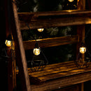 Guirnalda de luces solares jaula de diamante de acero 10 bombillas LED redondas blanco cálido MILY 3,90m - REDDECO.com