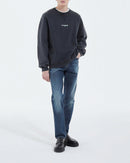 Vaqueros slim fit con lavado azul y cinco bolsillos - Hombre