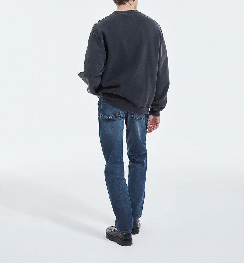 Vaqueros slim fit con lavado azul y cinco bolsillos - Hombre