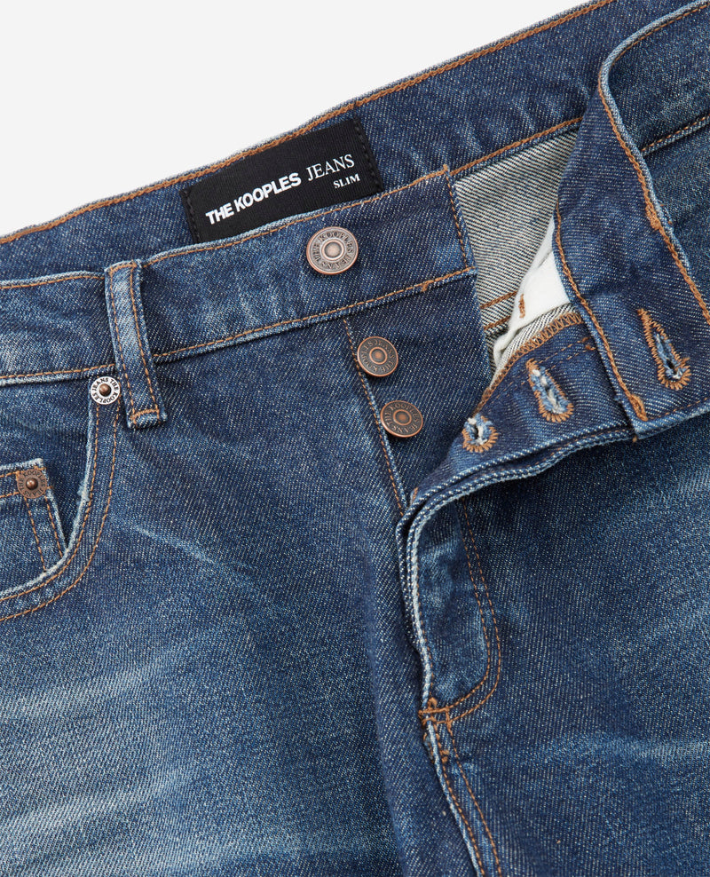 Vaqueros slim fit con lavado azul y cinco bolsillos - Hombre