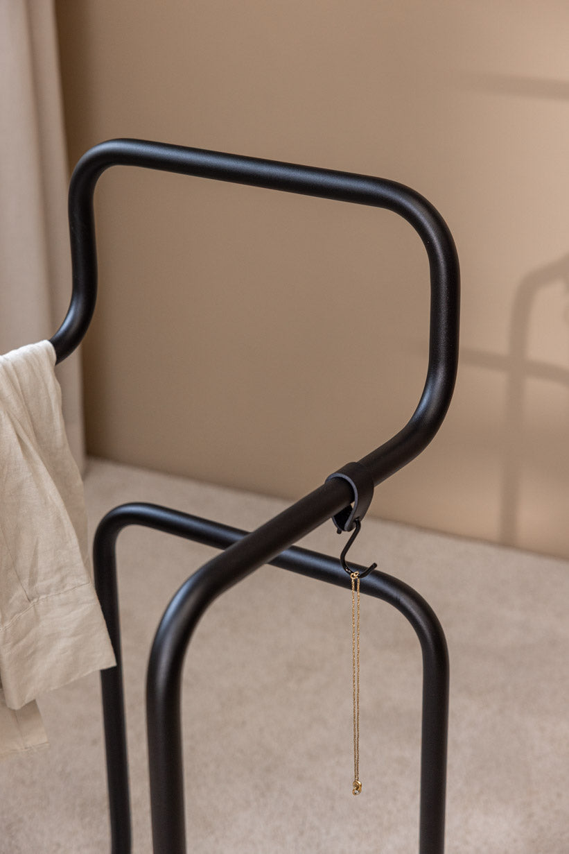 Minimalist clothing and accessories for stylish outfits.