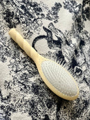 N.04 La Brosse Démêlante & Massante La Miracle Ivoire Cair