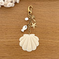 Bijou de sac "Coquillage" acier