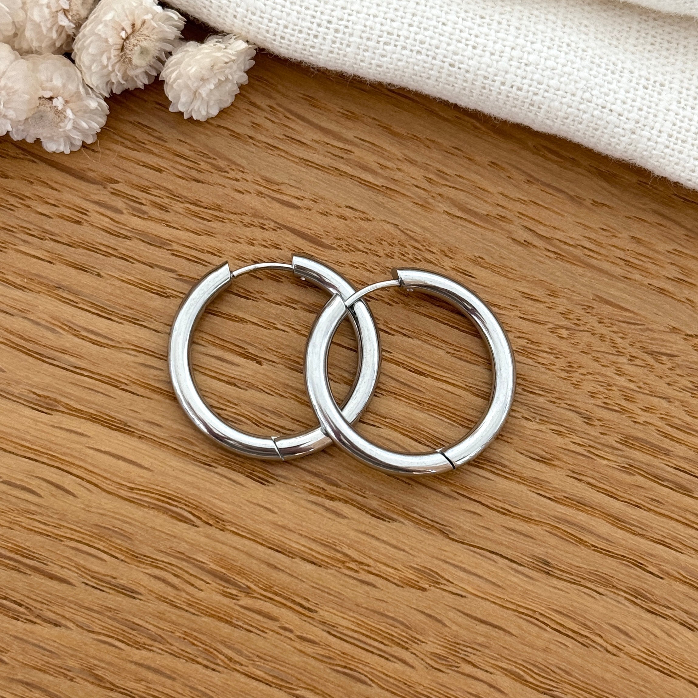 Pendientes aros “Filo” acero plateado