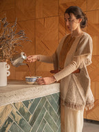 Poncho corto de inspiración amerindia