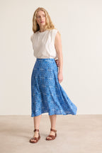 Jupe midi à taille élastiquée coloris bleu à motifs longueur midi fluide et légère marque parisienne 