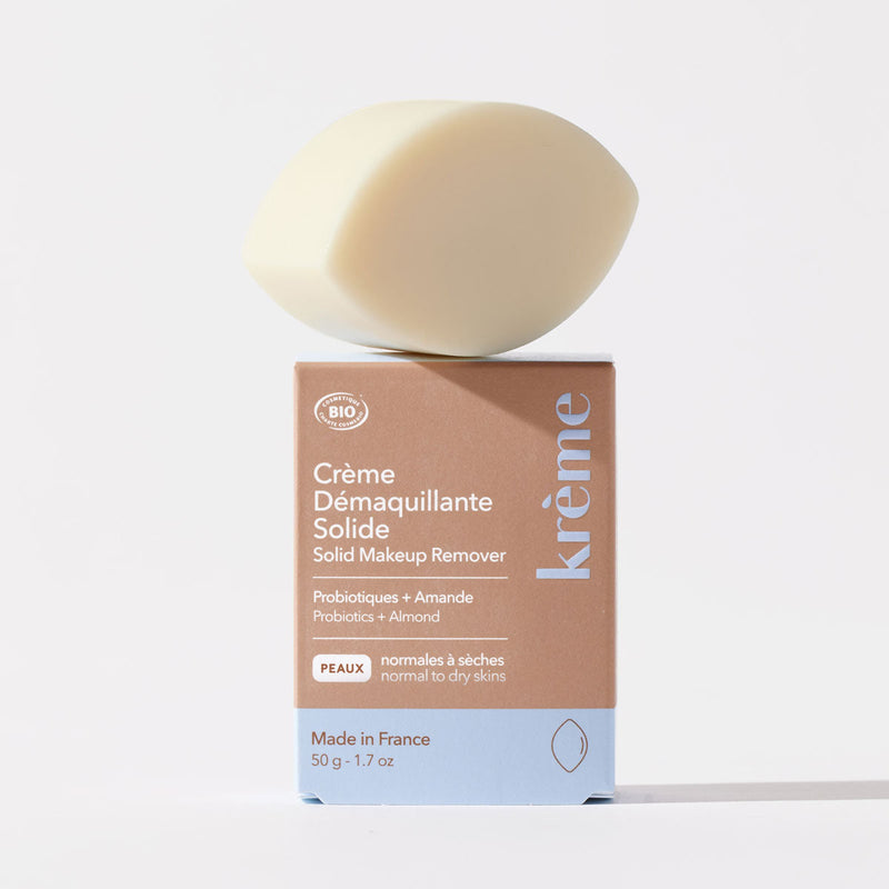 Solid facial makeup remover with probiotics