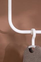 Details of ENIO's clothes in a different form with a wool sweater.