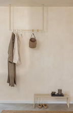 RUBI clothing with minimalist clothing and accessories in an elegant Ankleidebereich.