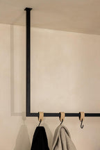 RUBI clothes with minimalist designs, ideal for stylish Ankleidezimmer and practical Kleideraufbewahrung.