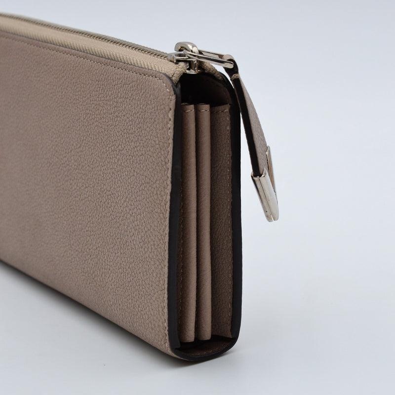 Louis Vuitton Portefeuille Comète Taurillon Taupe