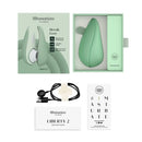 boîte coffret womanizer liberty 2 sextoy clitoridien à air pulsé contenant le produit, son câble de chargement et le mode d'emploi