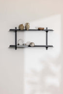 Wandregal LINARA coloca una construcción metálica minimalista y jarrones decorativos en las paredes.