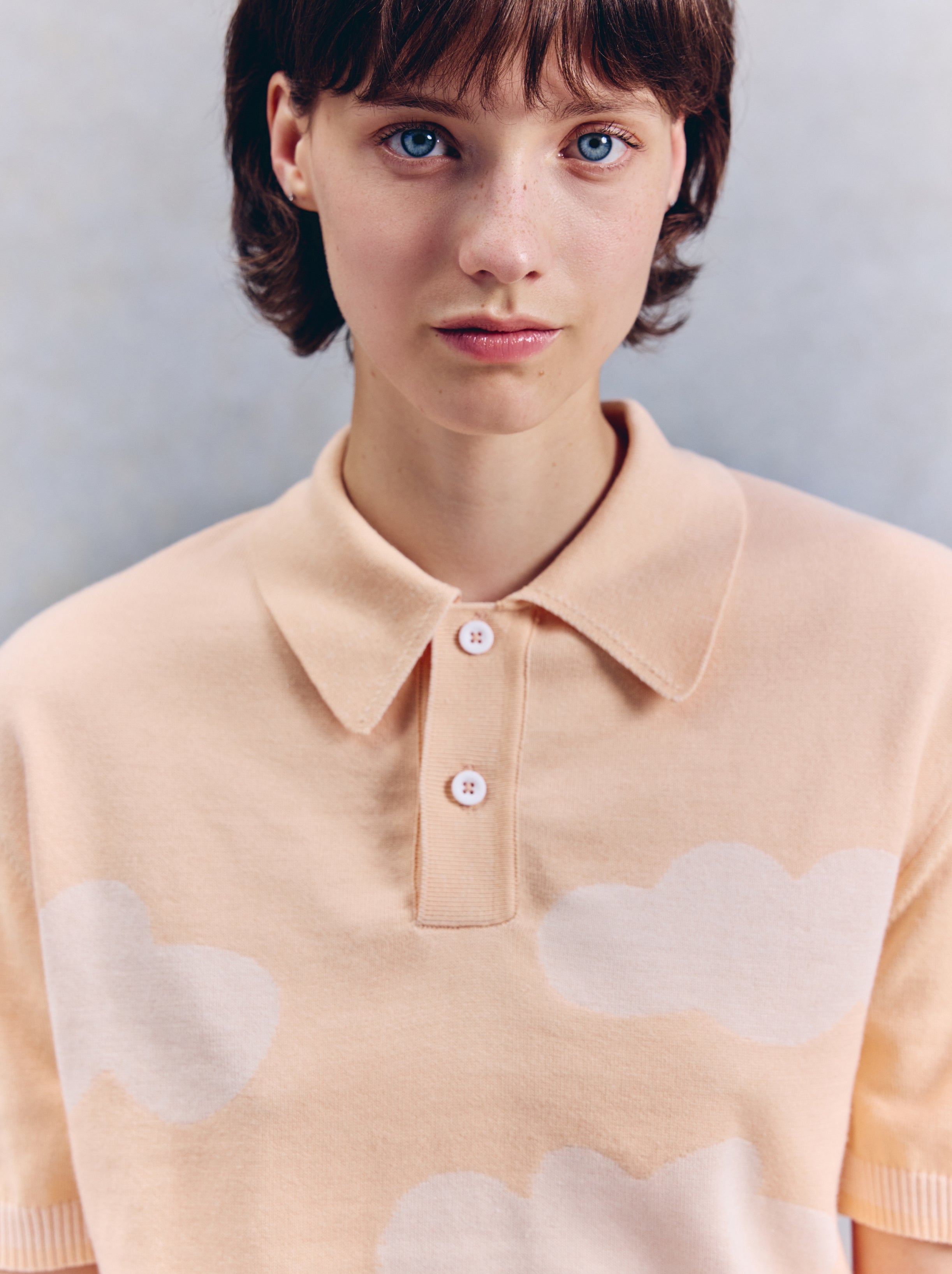 Polo unisex Nubes de albaricoque