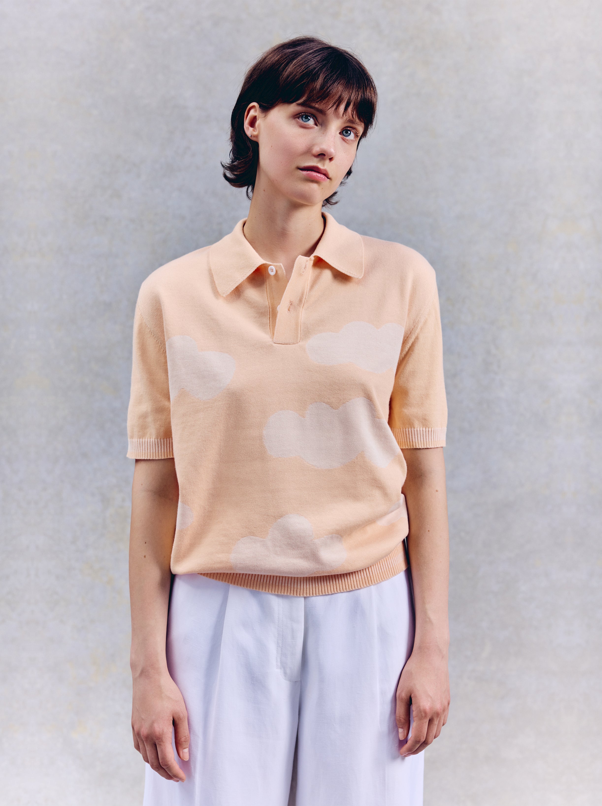 Polo unisex Nubes de albaricoque