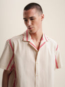 Man in white shirt with red embroidery, RED FOLKLORE SHORT SLEEVE SHIRT.