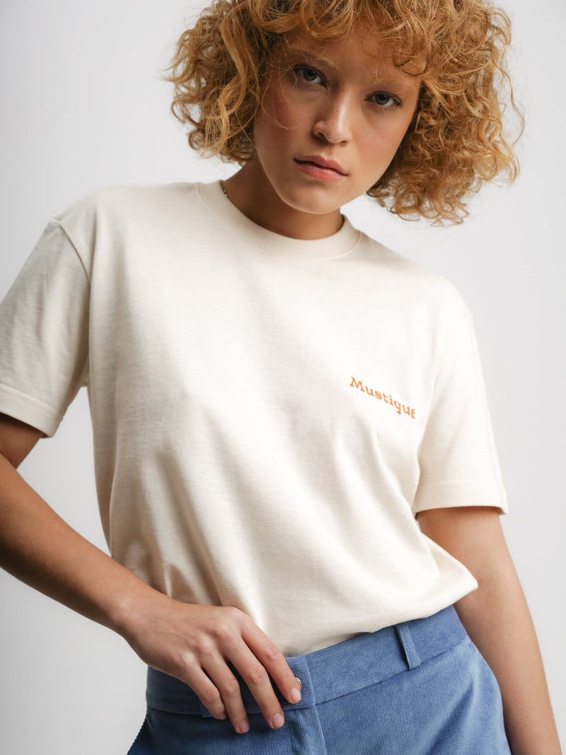 Garden Services T-Shirt in Ecru: A comfortable and stylish t-shirt designed for garden enthusiasts.