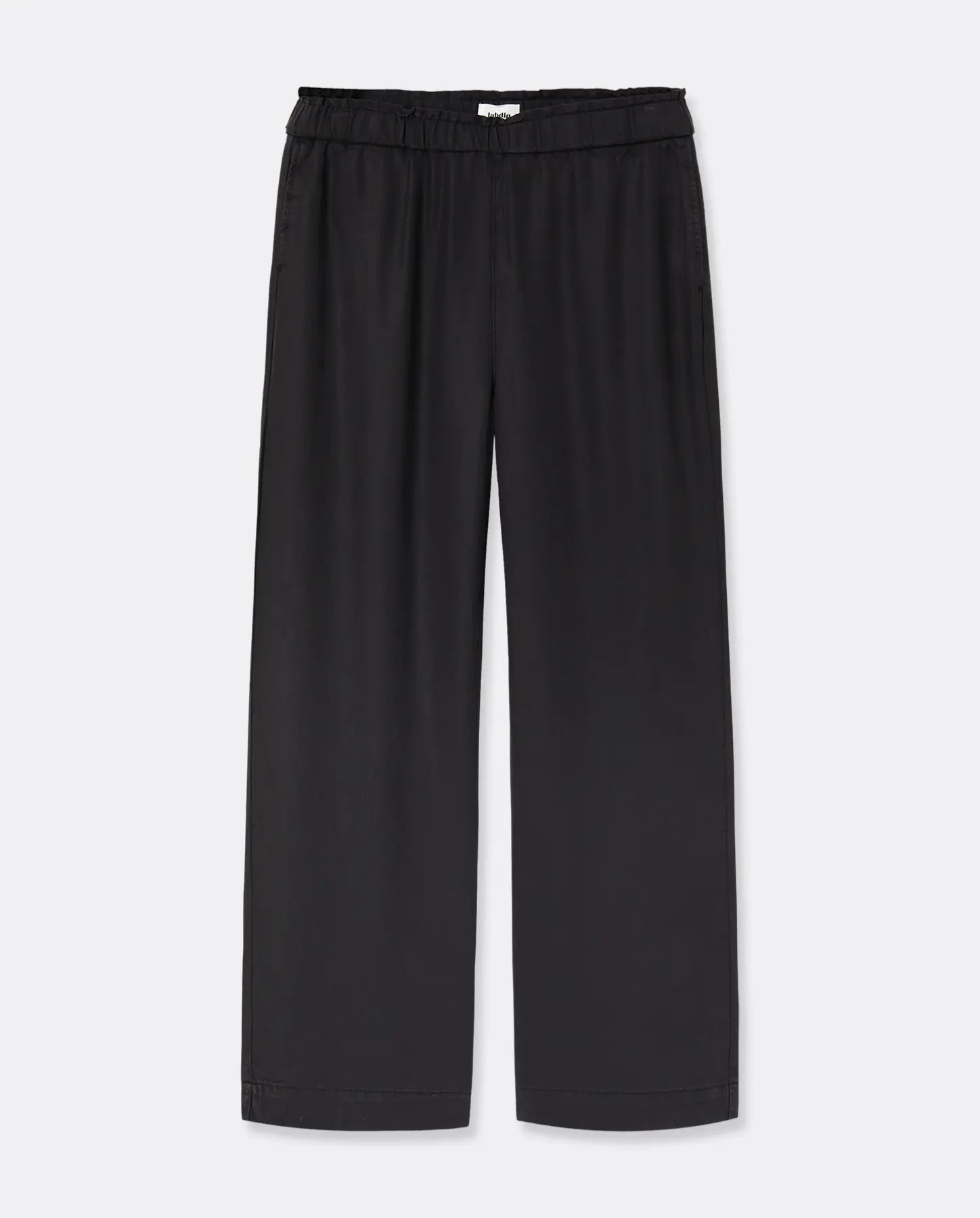 Pantalon fluide marron en tencel, coupe droite et ample, conçu pour s’adapter à toutes les morphologies féminines avec un confort optimal.