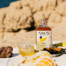 OSCO L'Original est un apéritif sans alcool peu sucré pour vos apéros d'été. Ses recettes de cocktails sans alcool offrent tous les plaisirs d'un apéritif : des saveurs Méditerranéennes rafraîchissantes.