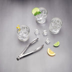 Cubo de hielo con pinzas