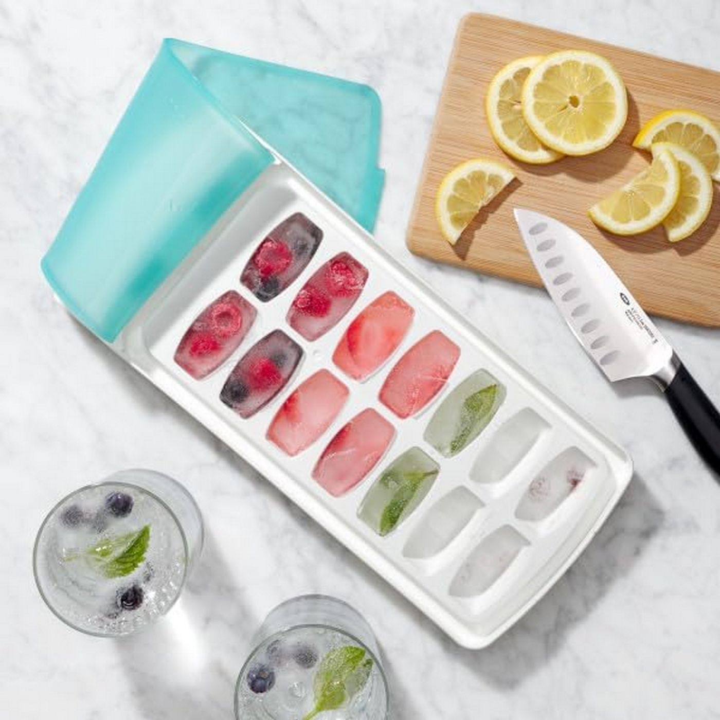 Set: 2 cubiteras con tapa antiderrames