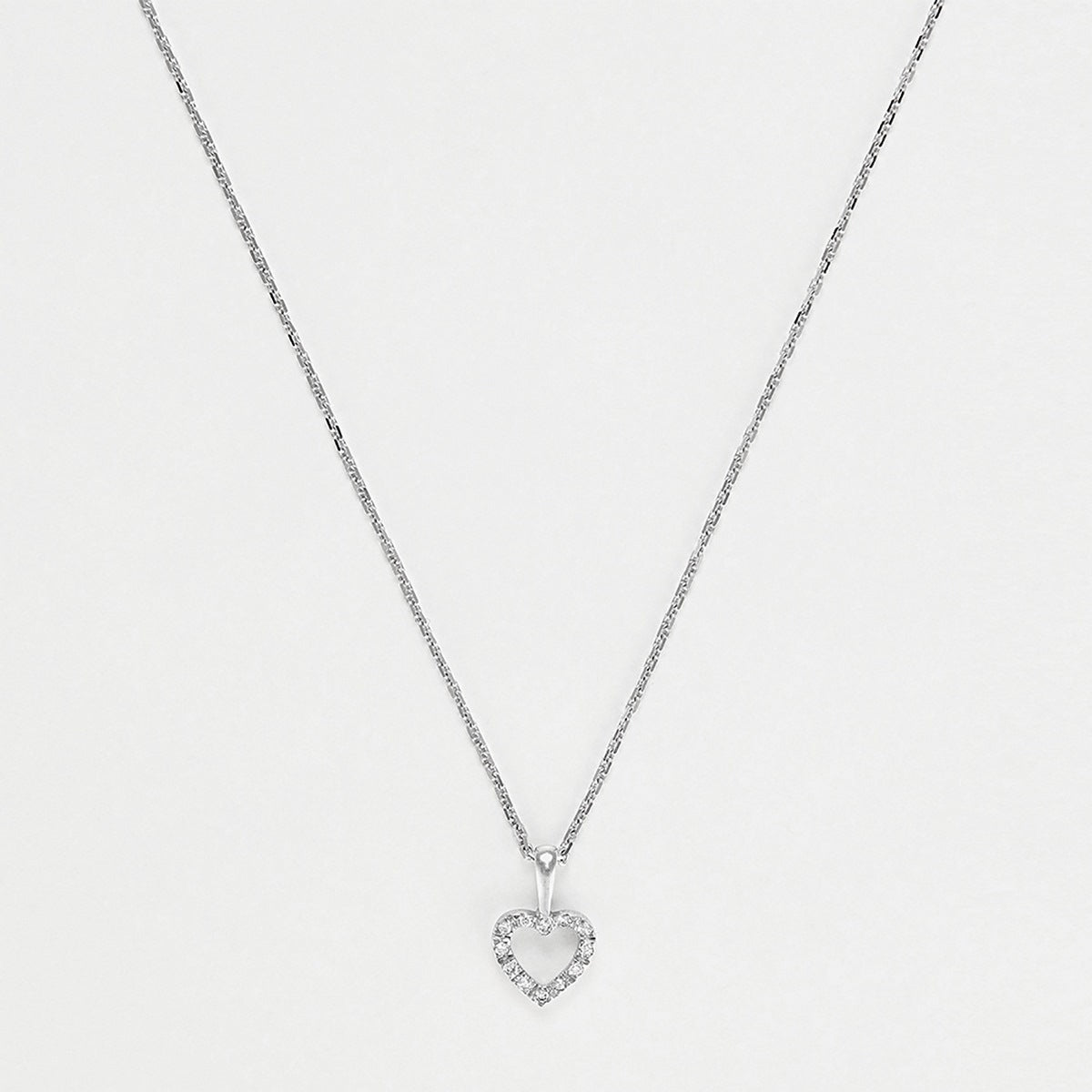 Pendentif Or Blanc 375/1000 "Mini coeur" D:0,04ct/12
