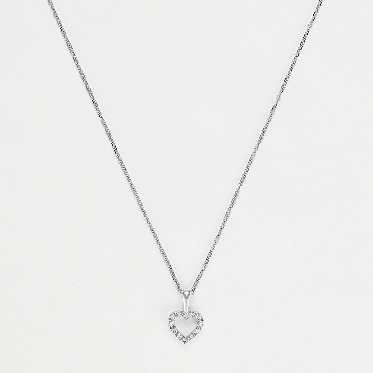 Pendentif "Mini Coeur"  D:0,04Ct/12