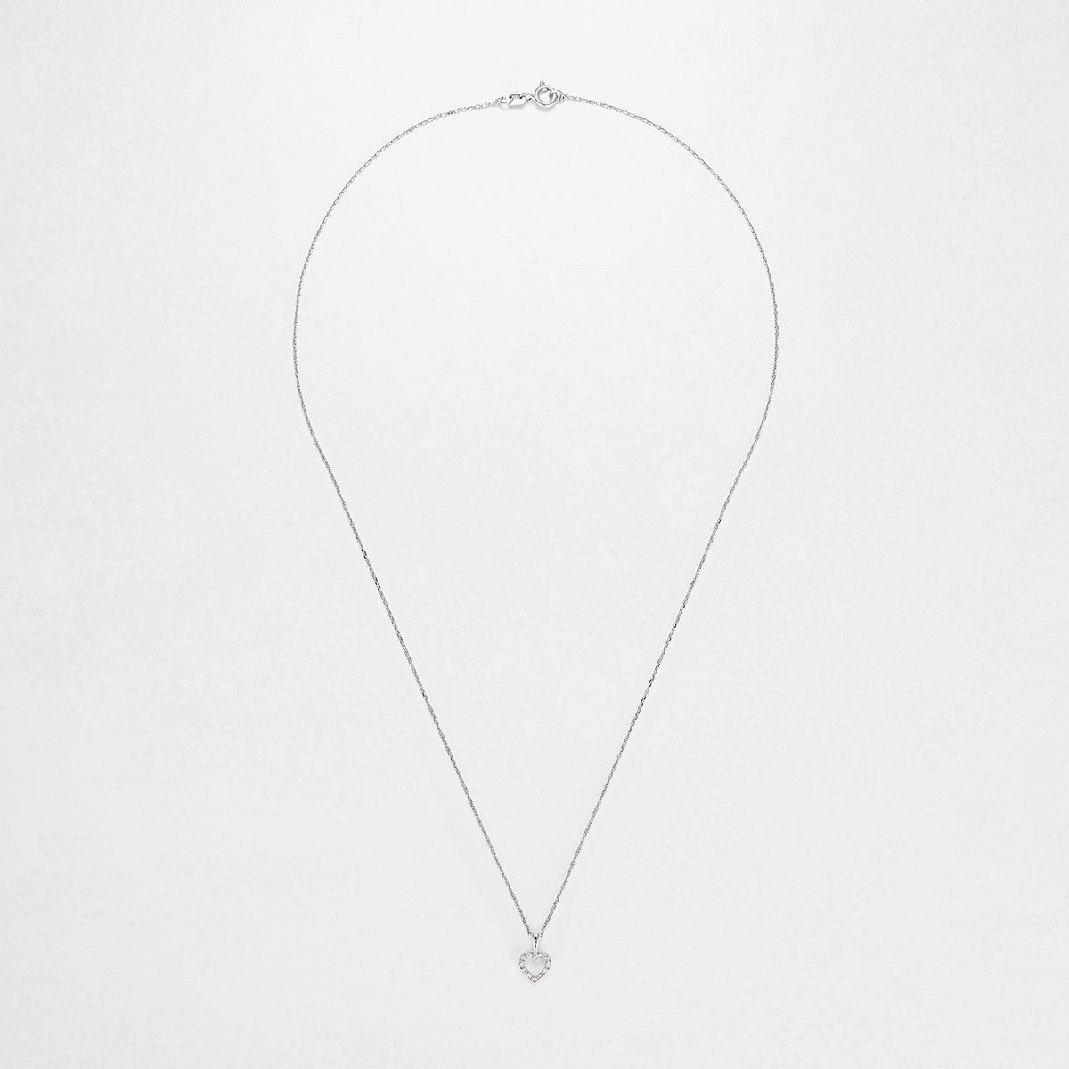 Pendentif "Mini Coeur"  D:0,04Ct/12