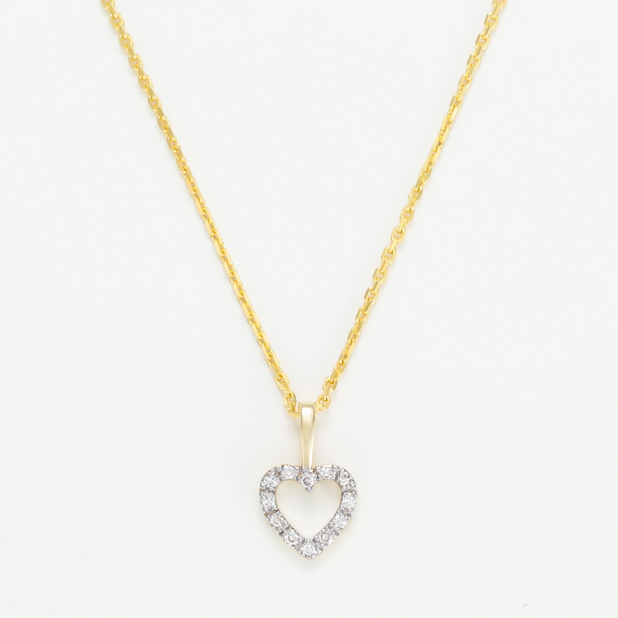 Pendentif "Mini Coeur"  D:0,04Ct/12 - Or Jaune 375/1000