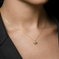 Colgante "Nudo Elegancia" D0.04Ct/8 - Oro amarillo 375/1000