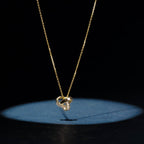 Colgante "Nudo Elegancia" D0.04Ct/8 - Oro amarillo 375/1000