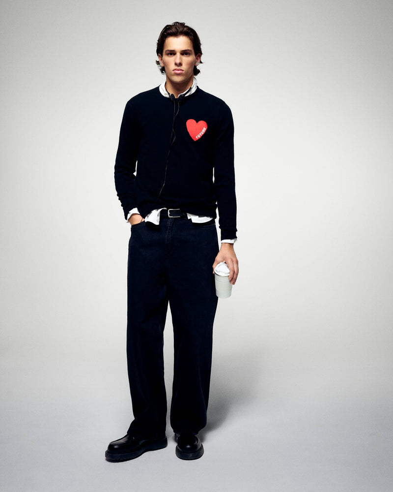 #label: Dren mesure 1,89m et porte une taille M