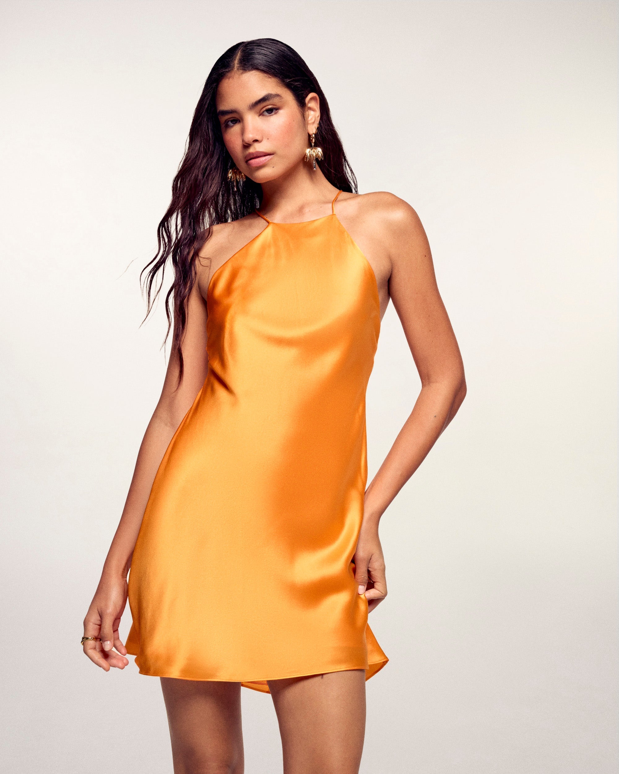 #label: Andrea mesure 1,80m et porte une taille S
