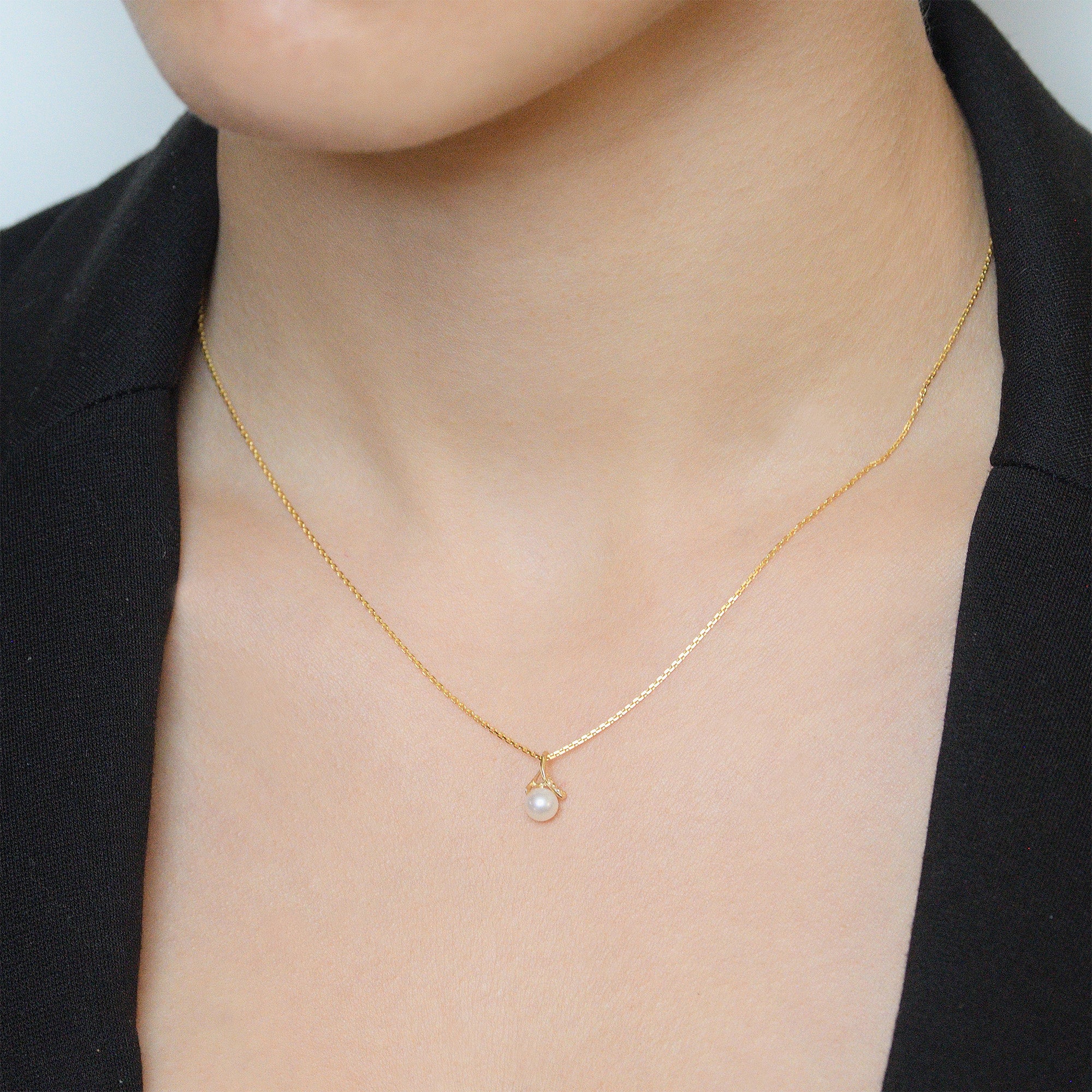 Colgante Phenix - Oro Amarillo Perla Blanca y Circonio