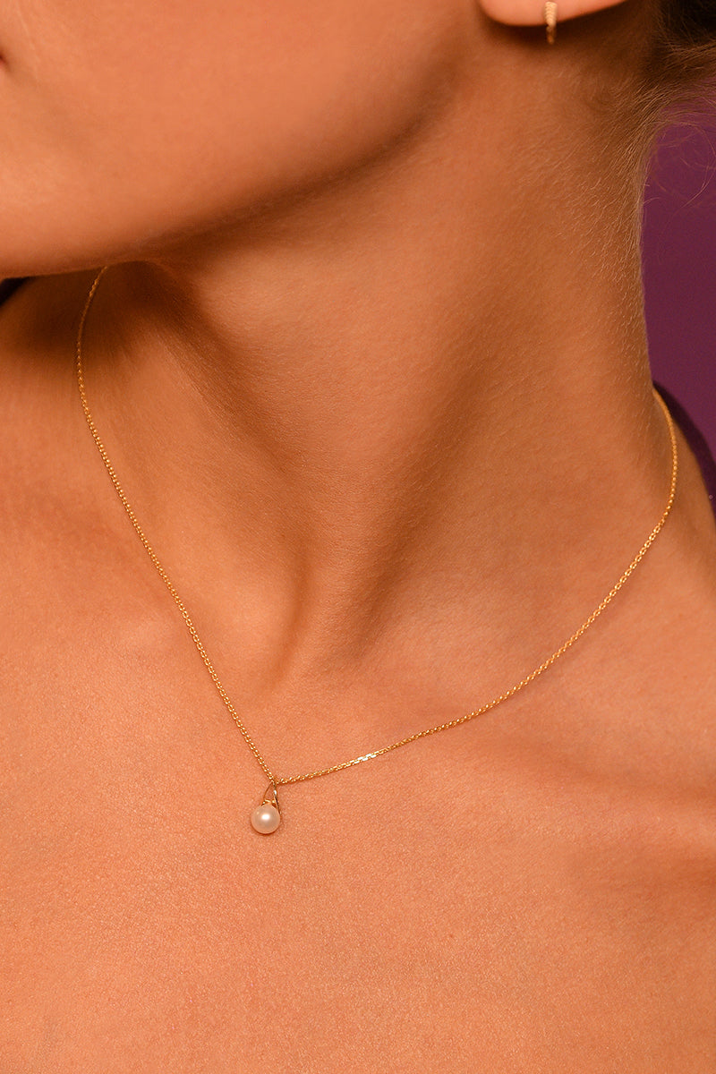 Colgante Phenix - Oro Amarillo Perla Blanca y Circonio