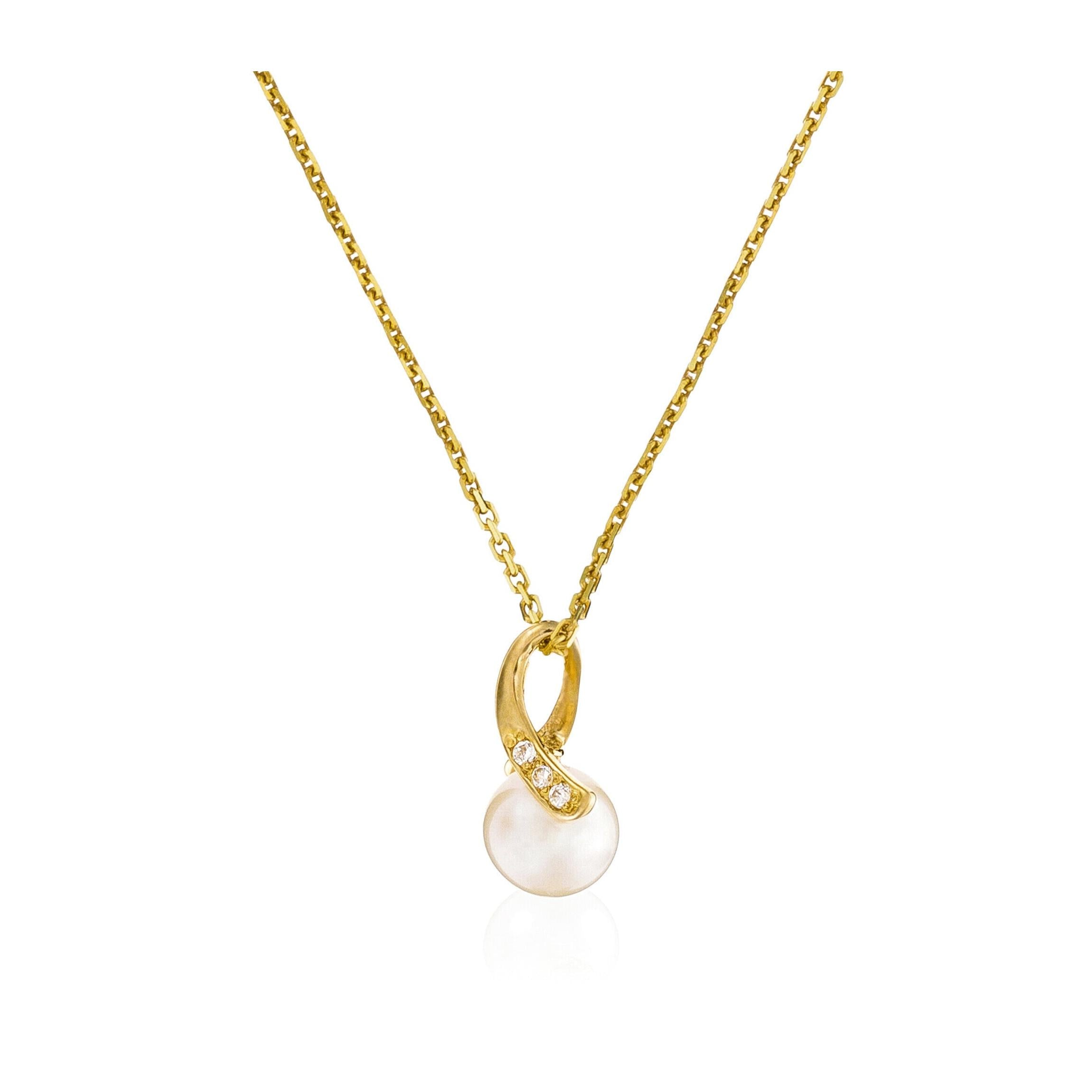 Colgante “Phenix” Oro amarillo 375/1000 Perla blanca y circonio