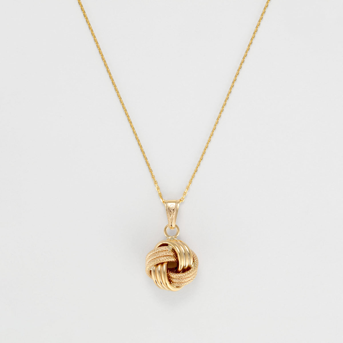Pendentif " Noeud Torsadé "  12 Mm Or Jaune 375/1000