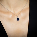 "Bermuda News" Pendant - 375/1000 White Gold