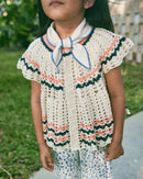 Cárdigan de mazapán Wellfleet - Selección Misha & Puff disponible en www.amaetc.com, concept store ecológico para niños