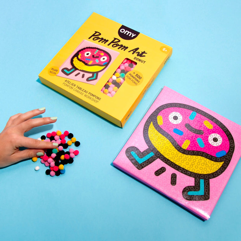 Contenu du kit tableau pompons Donut OMY – Pompons colorés et toile autocollante