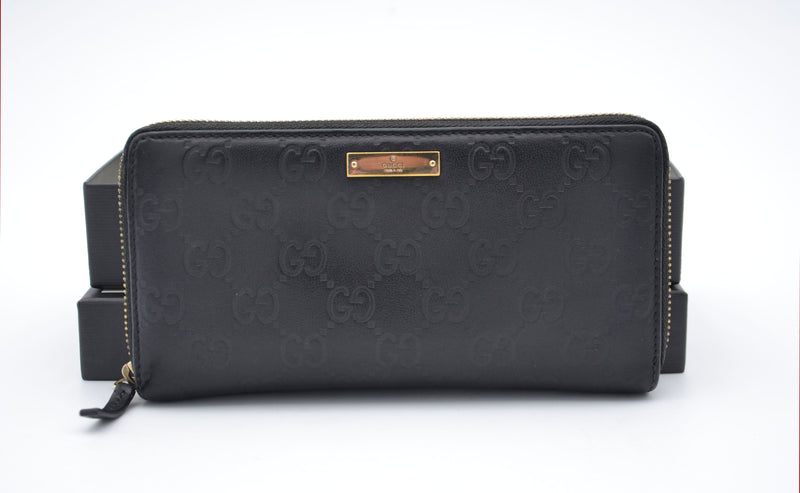 Cartera larga Gucci Zippy en cuero negro Guccissima