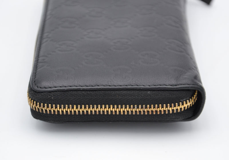 Cartera larga Gucci Zippy en cuero negro Guccissima