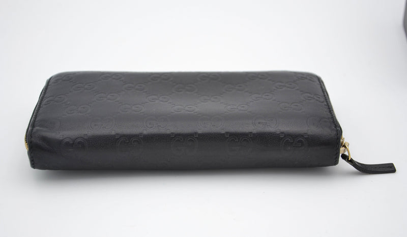 Cartera larga Gucci Zippy en cuero negro Guccissima