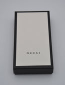 Cartera larga Gucci Zippy en cuero negro Guccissima