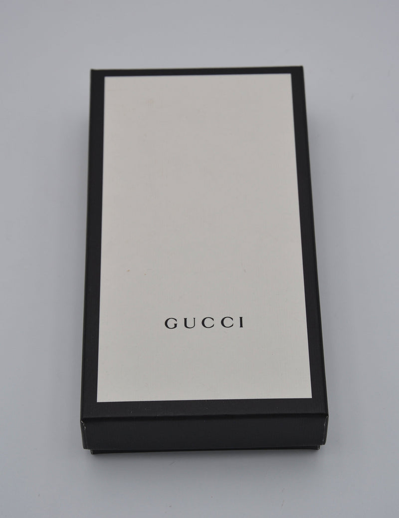 Cartera larga Gucci Zippy en cuero negro Guccissima