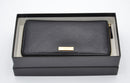 Cartera larga Gucci Zippy en cuero negro Guccissima